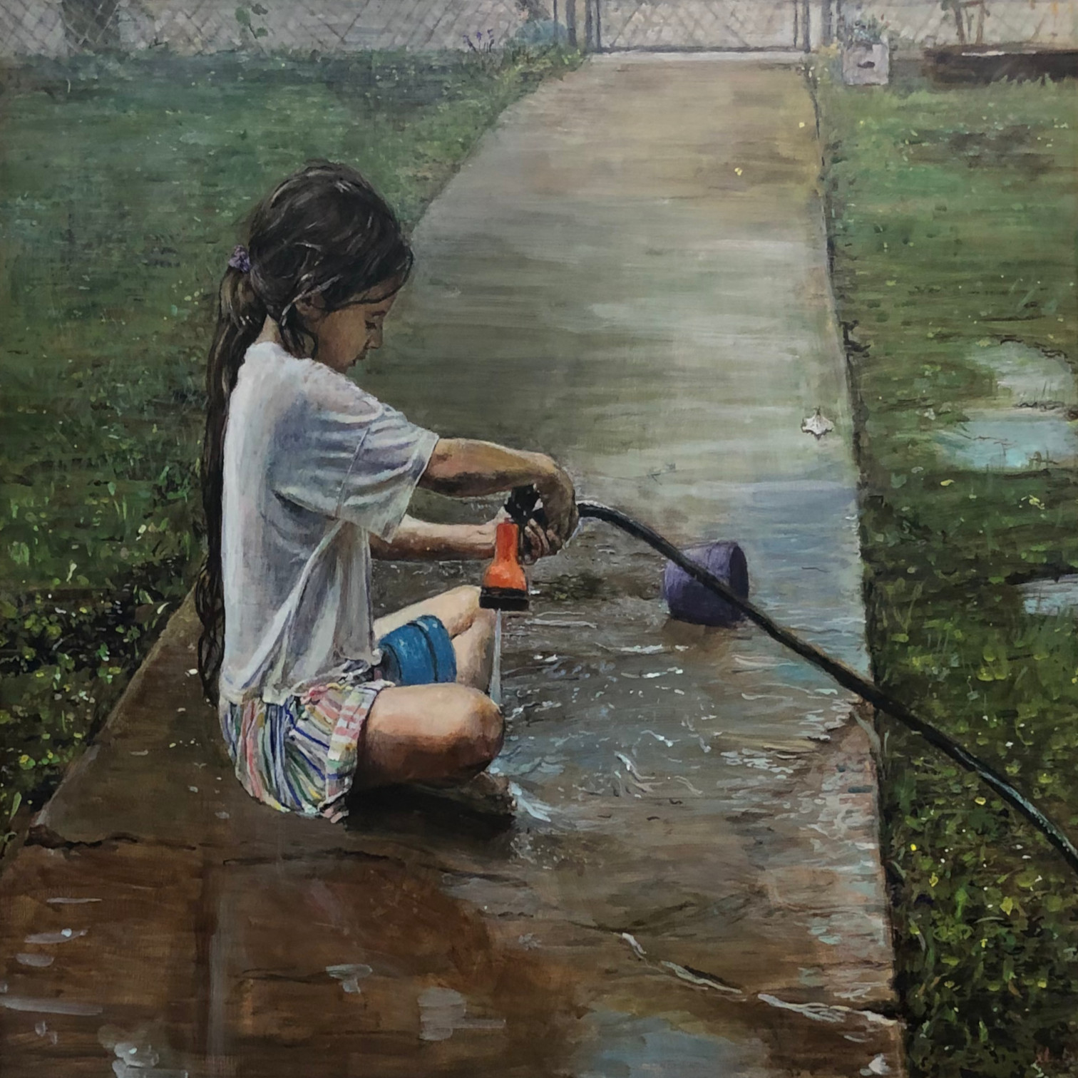 Young girl playing in water